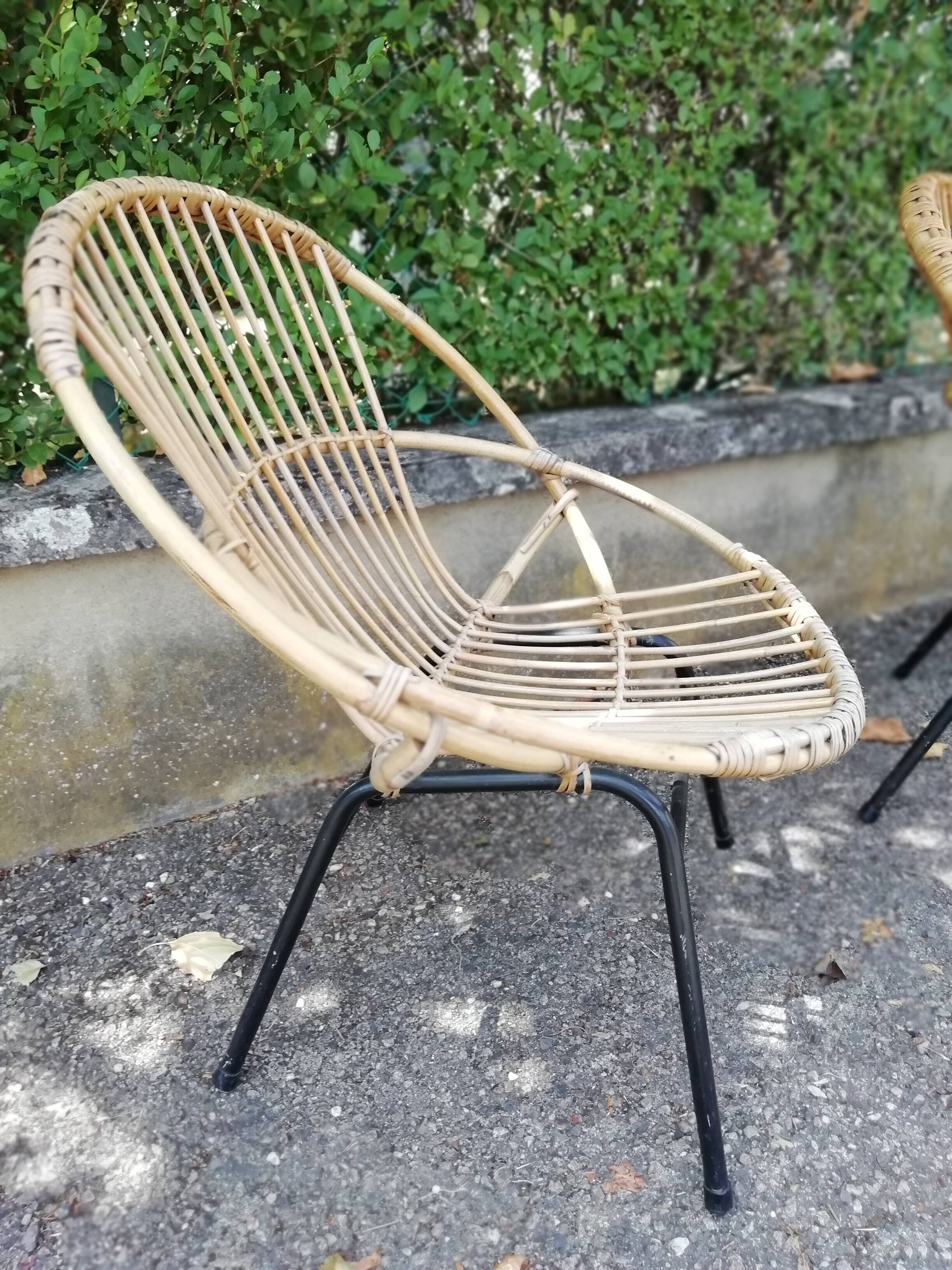2 Rattan shell armchairs and metal legs