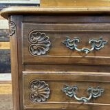 Curved commode in Louis XV style made of walnut.