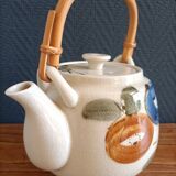 Asian style teapot with bamboo handle