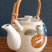 Asian style teapot with bamboo handle