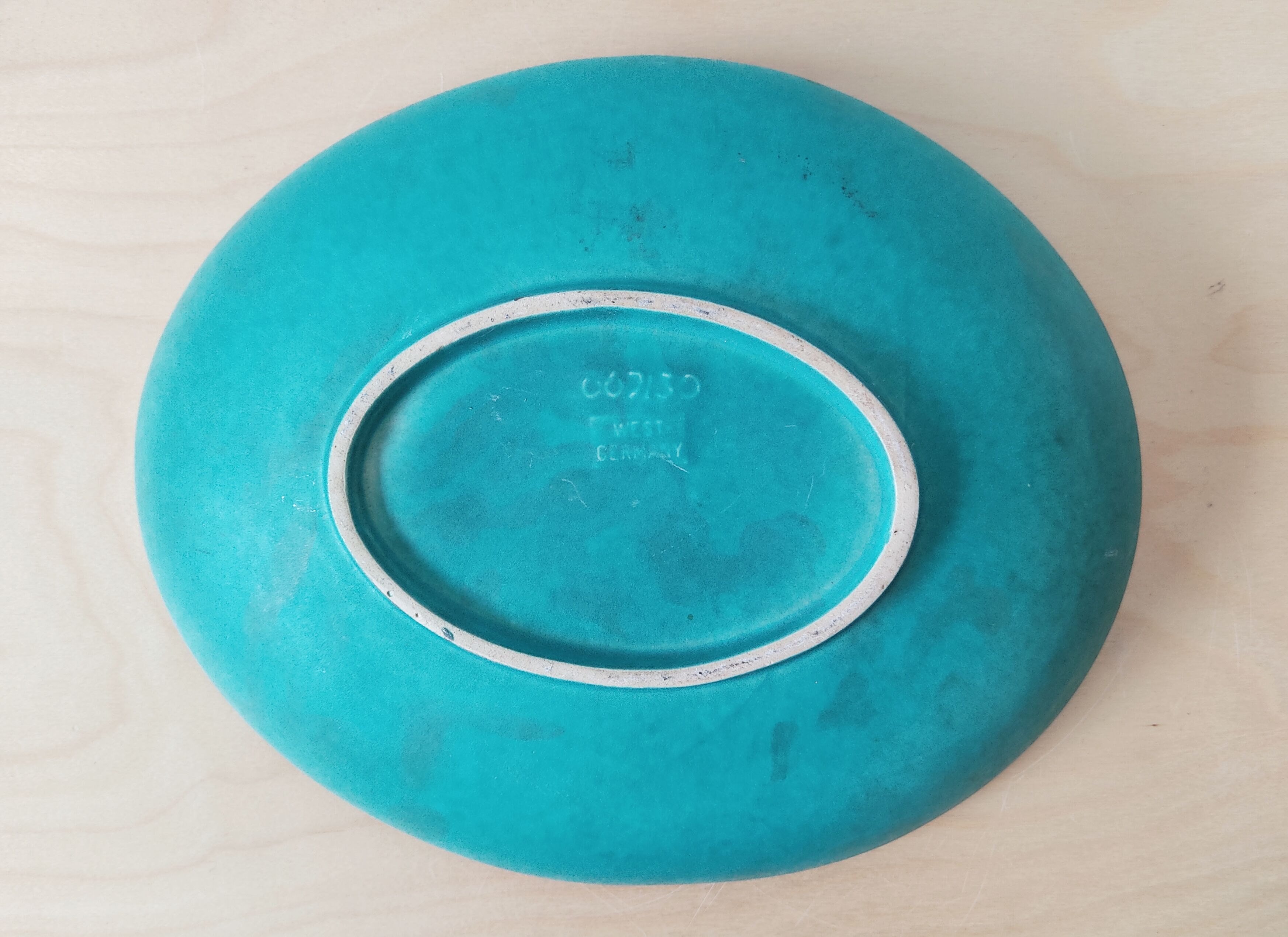 Flat empty pocket oval West Germany