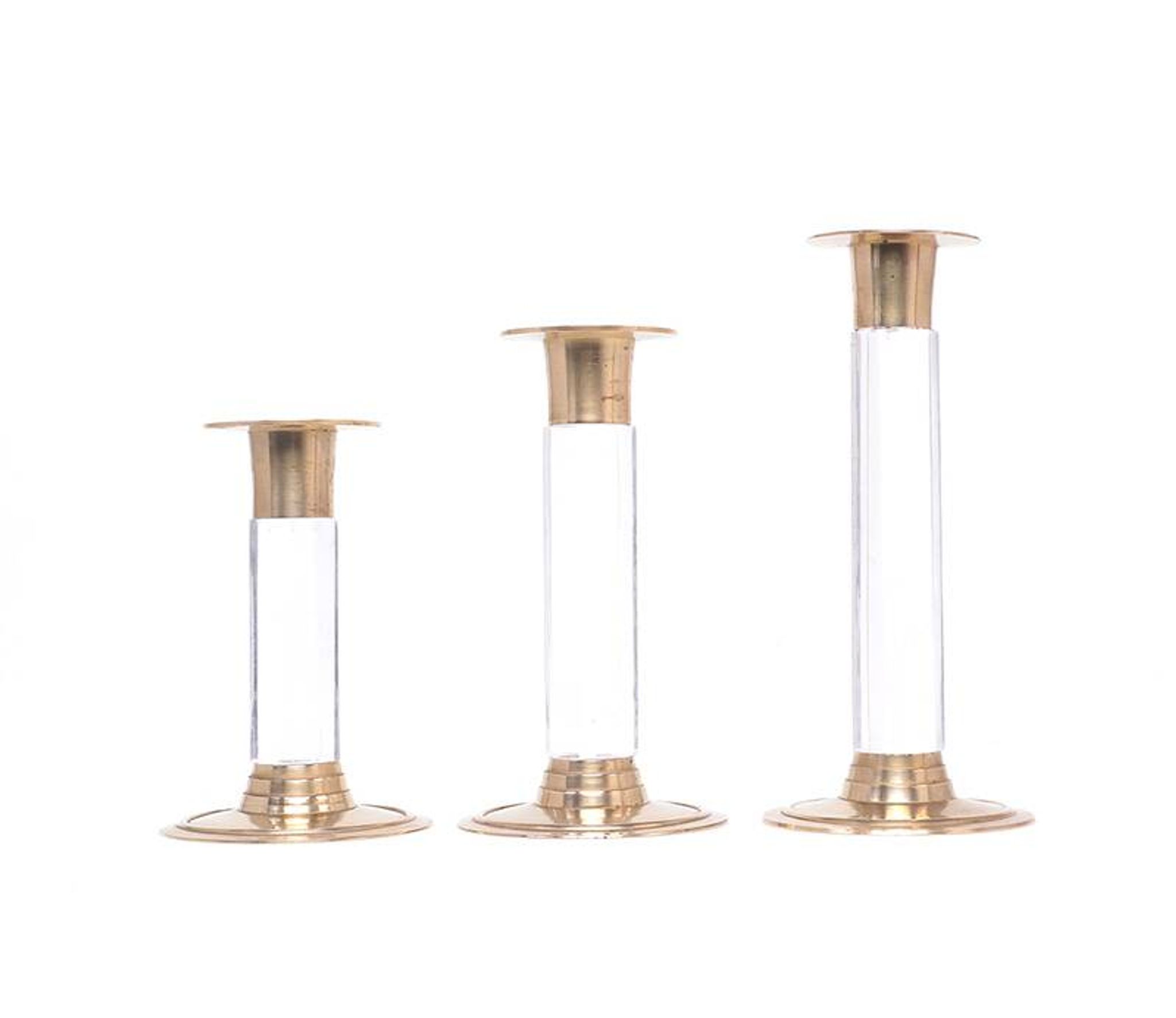Ensemble vintage de bougeoirs en laiton et en lucite, années 1970.