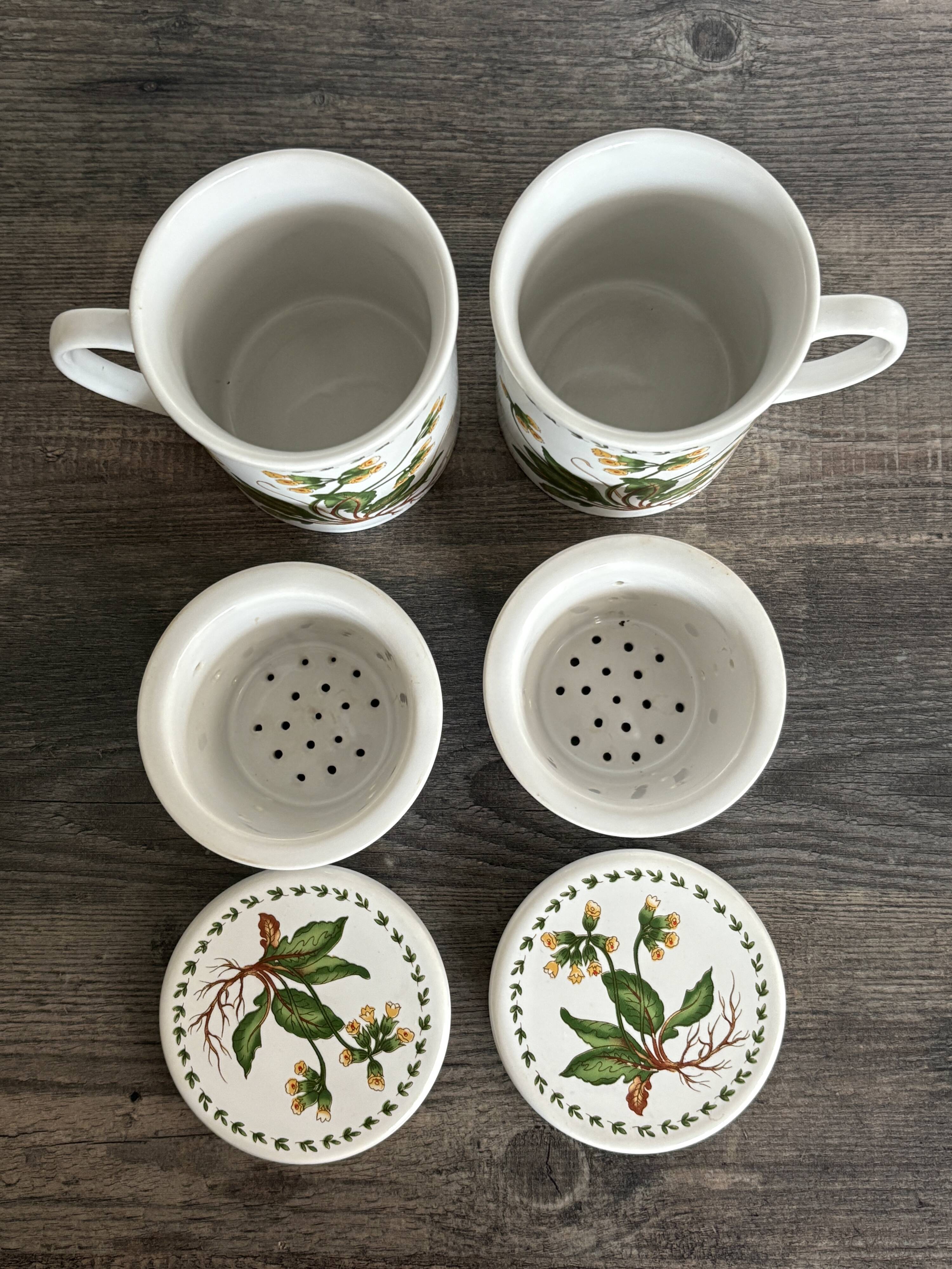 Pair of vintage infusion mugs.