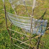 2 invisible folding chairs in metal and transparent plexiglass
