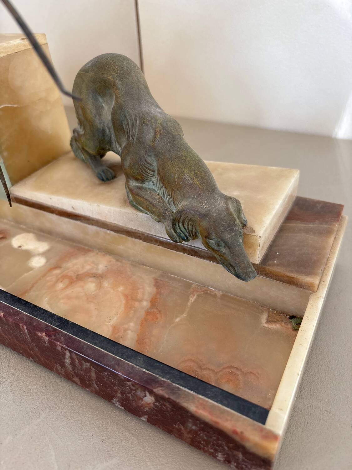 Sculpture of a woman with a greyhound