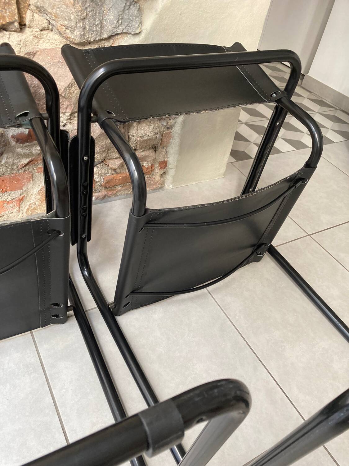 Pair of black armchairs