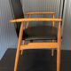A Scandinavian teak skai chair from the 1960s for a vintage desk table.