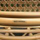 2 rattan and caned chairs in colonial bistro style from the 1990s.