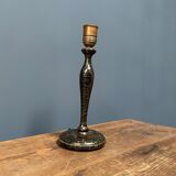 Black table lamp with paint splatters from the 1920s