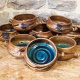 Set of 8 ceramic fondue pots from La Colombe pottery