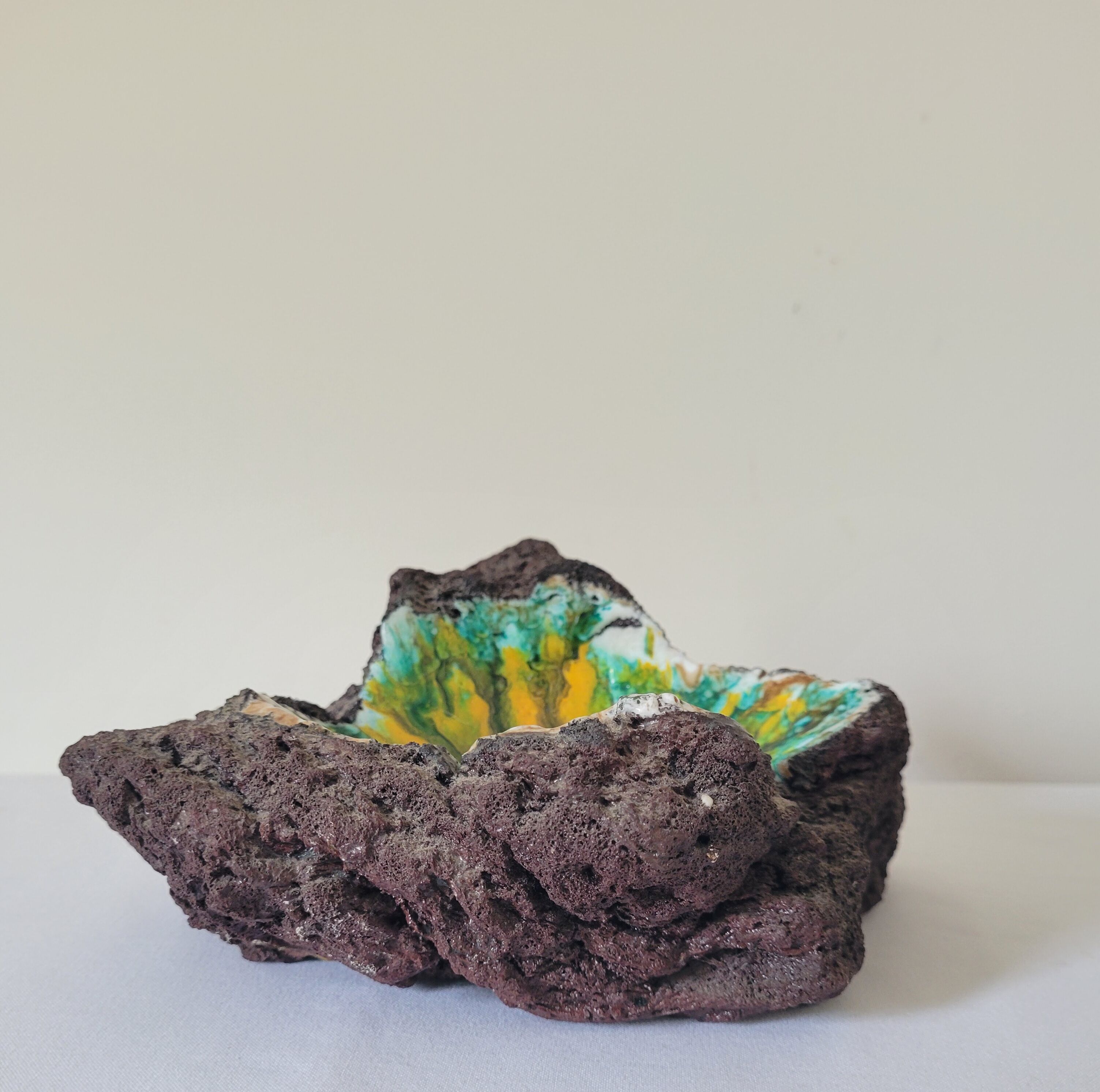 Enamelled lava stone ashtray