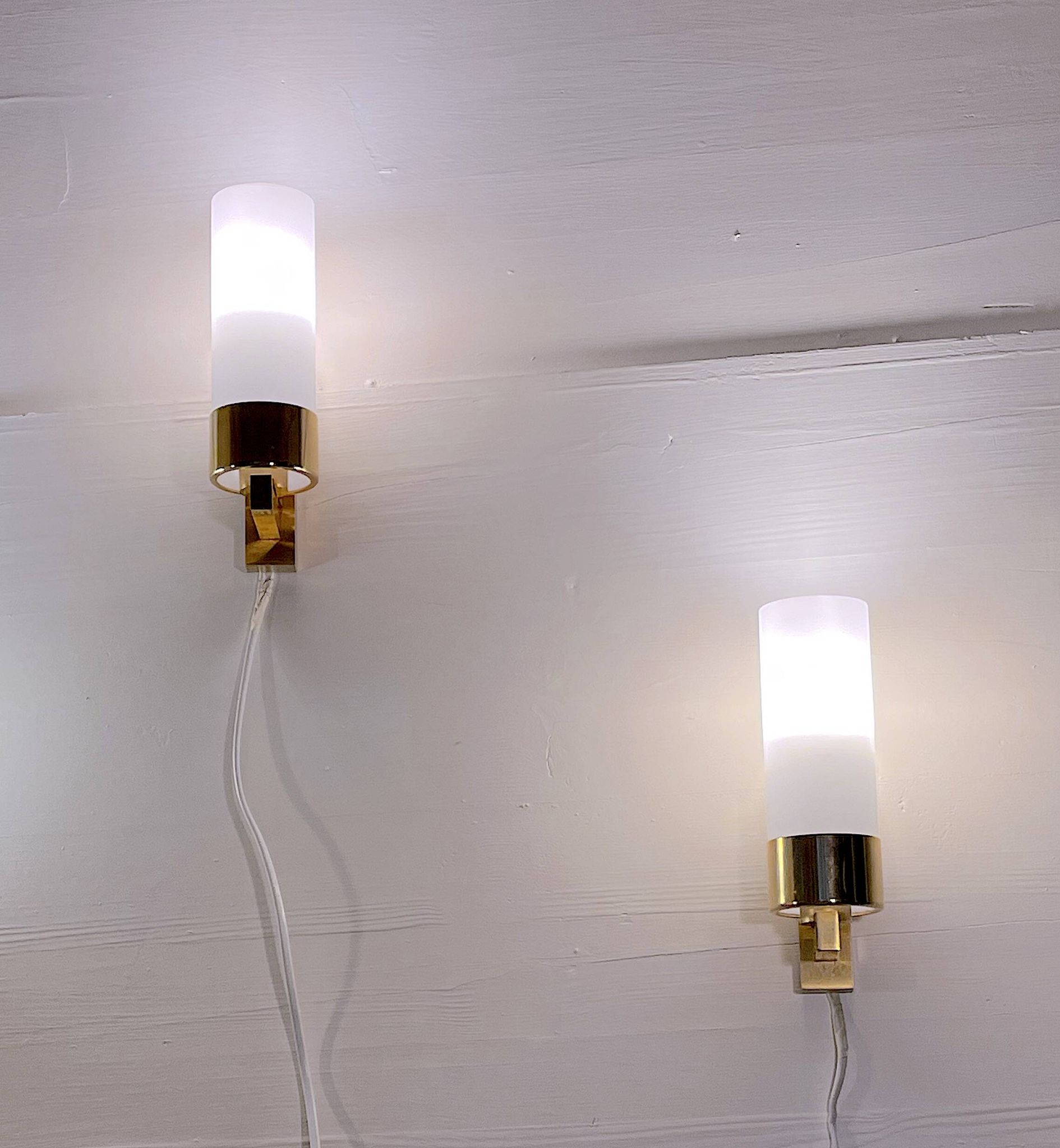 Set of three brass and opaline sconces, mid-century France
