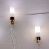 Set of three brass and opaline sconces, mid-century France