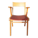 Old wooden and red leatherette bridge chair