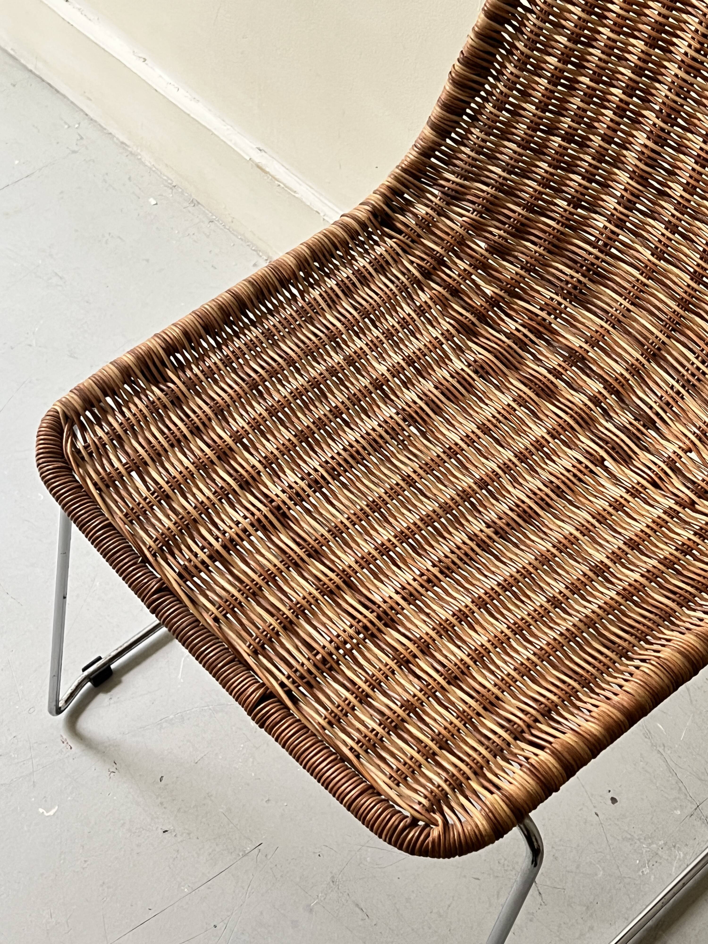 Chair made of rattan, wicker and chrome-plated metal
