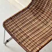 Chair made of rattan, wicker and chrome-plated metal