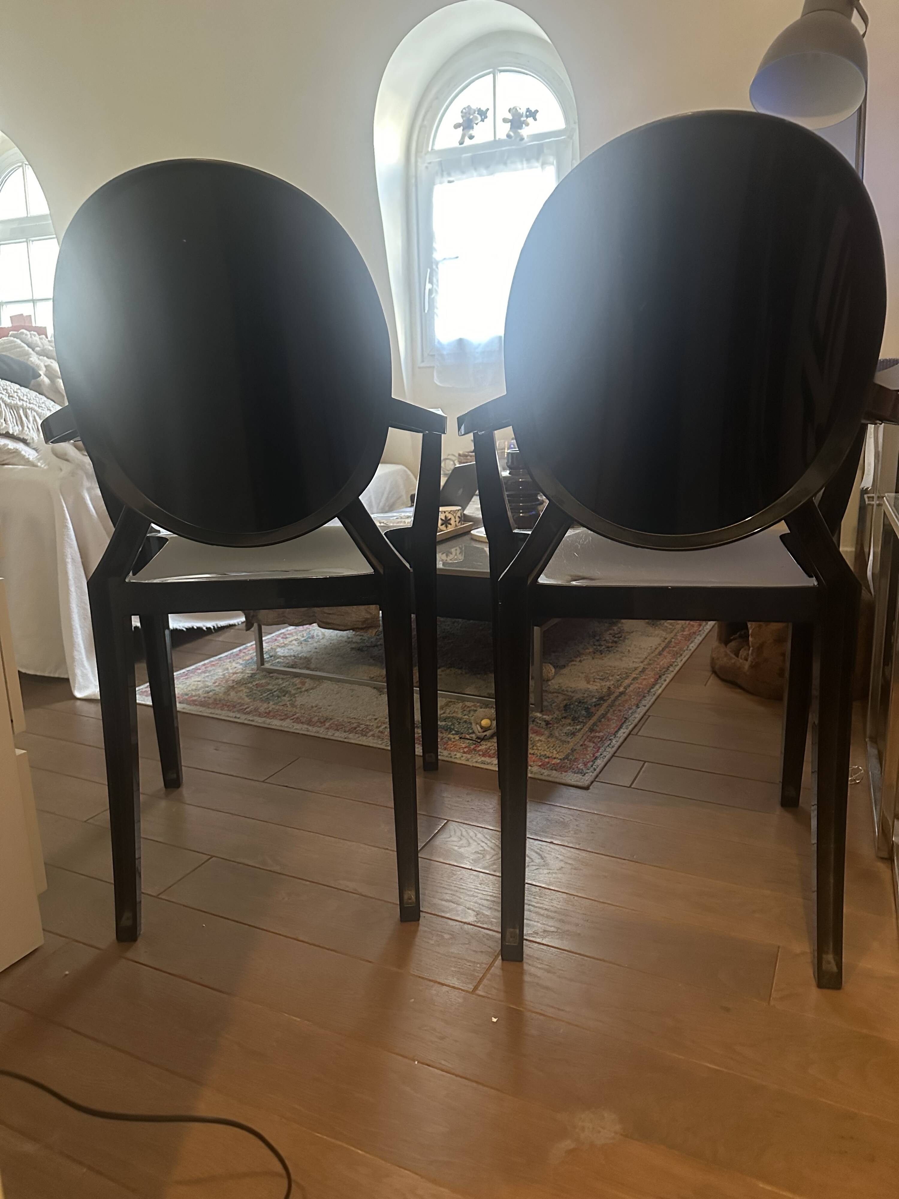 Louis Ghost chairs by Philippe Starck