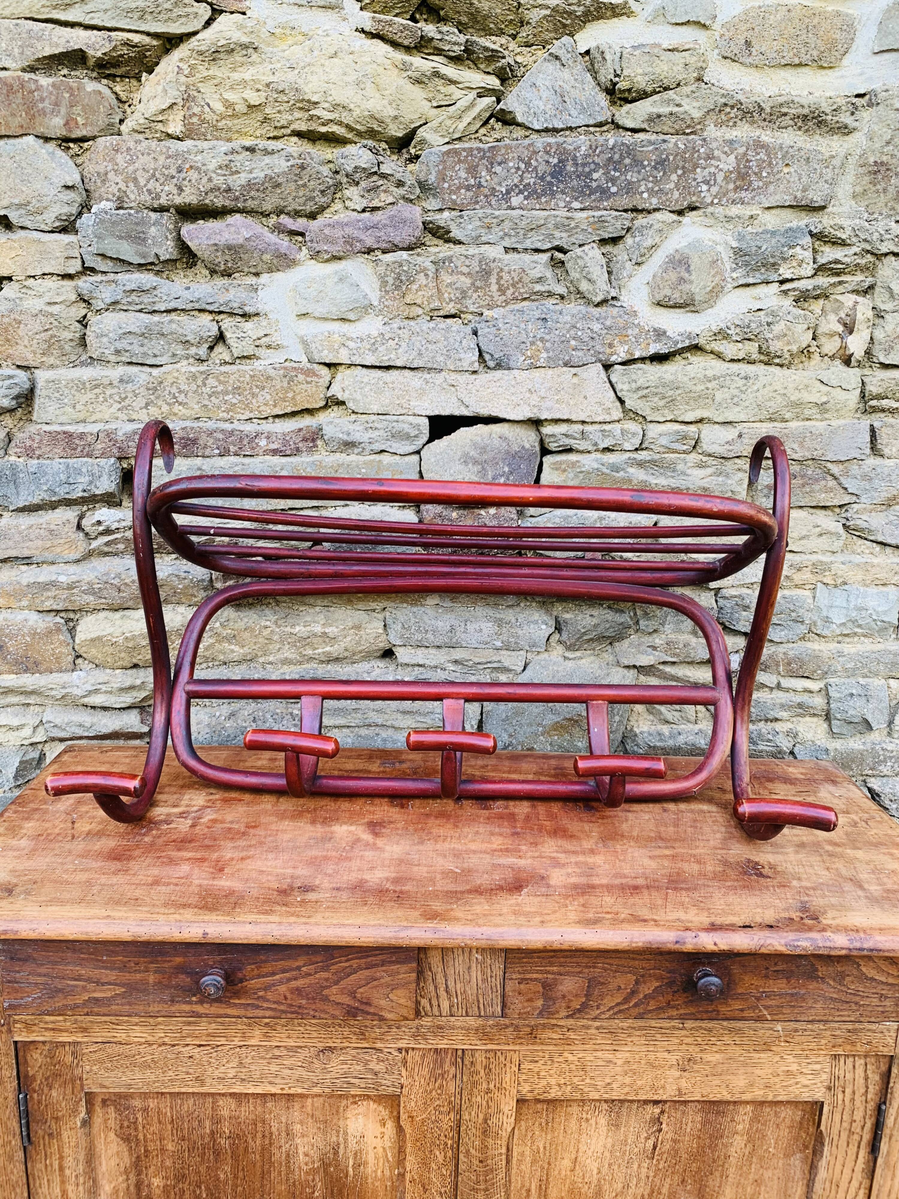 Antique curved wooden wall coat rack