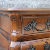 Curved Louis XV style chest of drawers known as a “tomb”