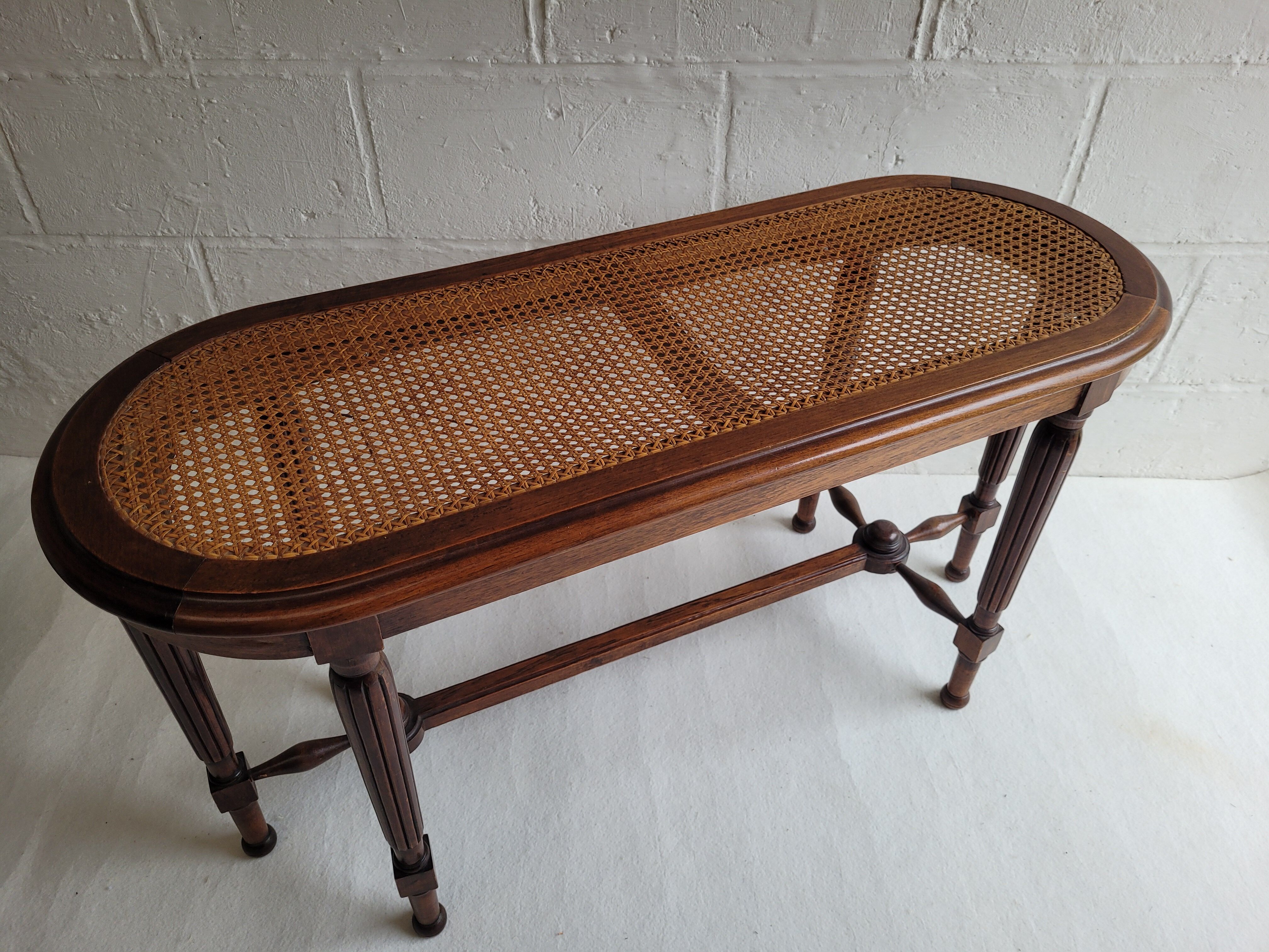 Wooden piano bench and cannage