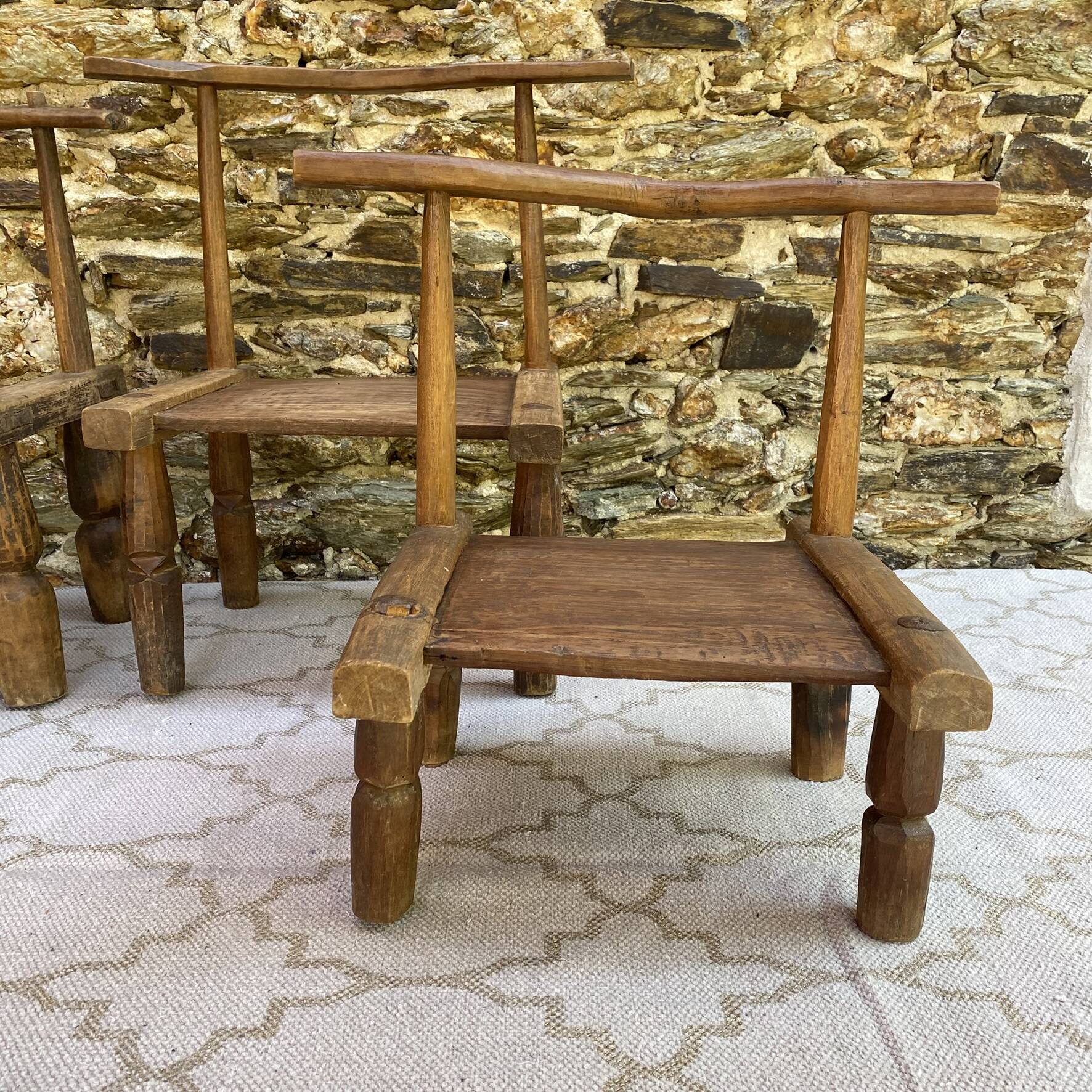 Ancient Baoulé African chairs in carved wood, Wabi-Sabi.
