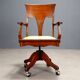 Antique oak swivel chair with wheels UK 20th Century