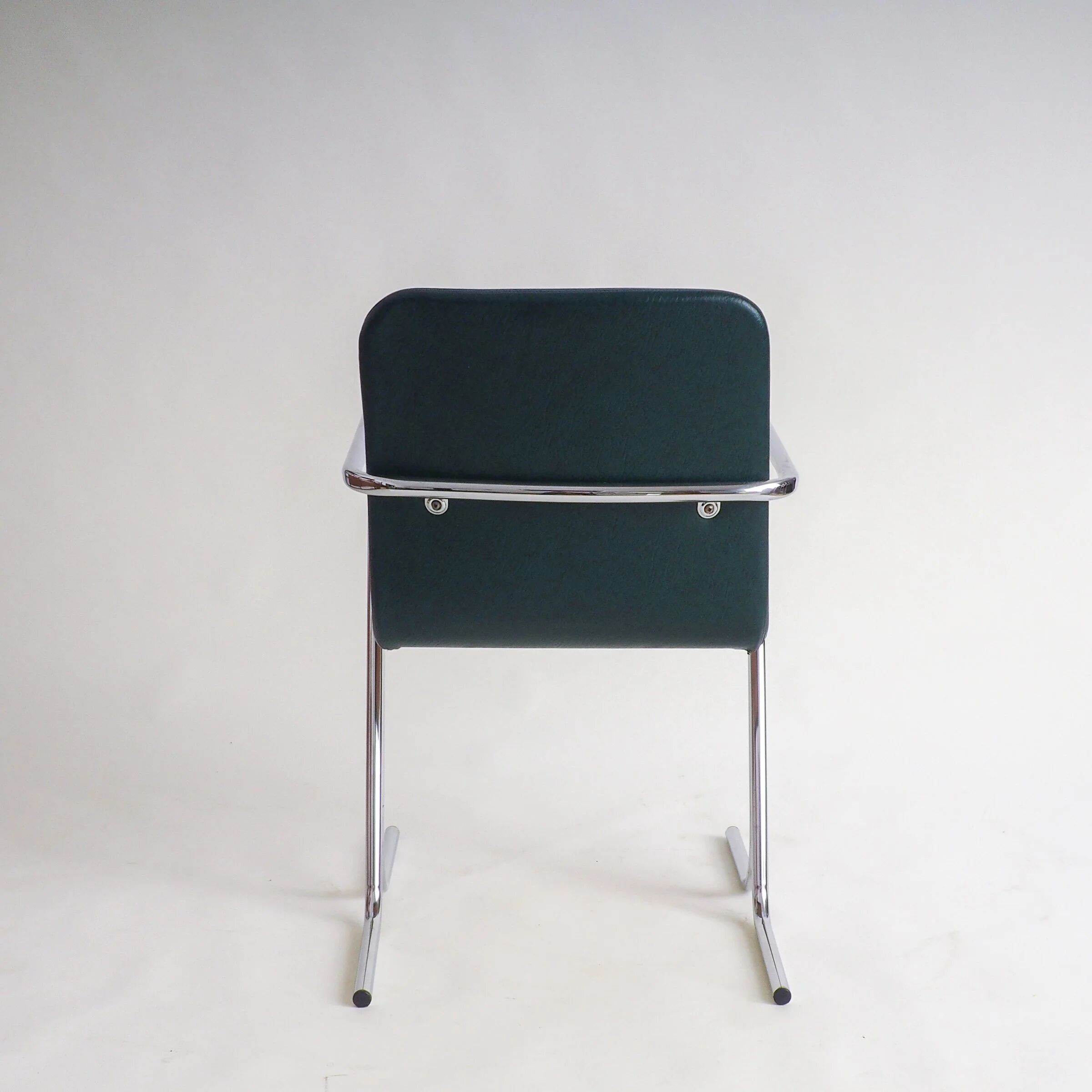 70s tubular arm chair by Tavo