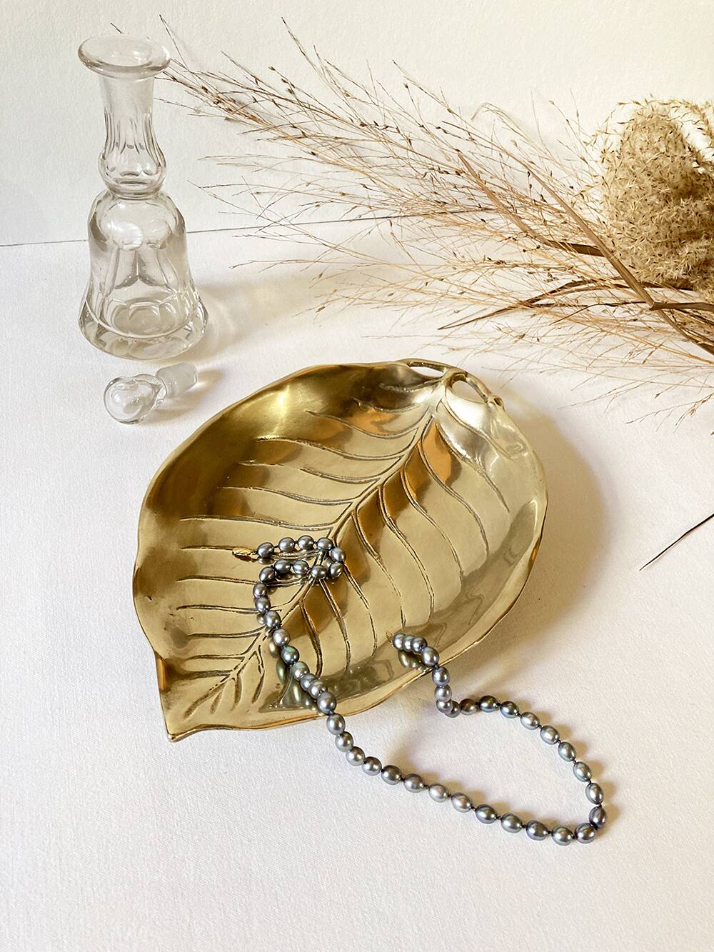 Brass pocket emptier