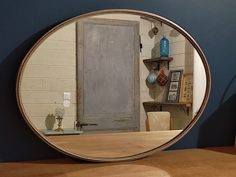 Oval mirror metal patinated pearl art deco