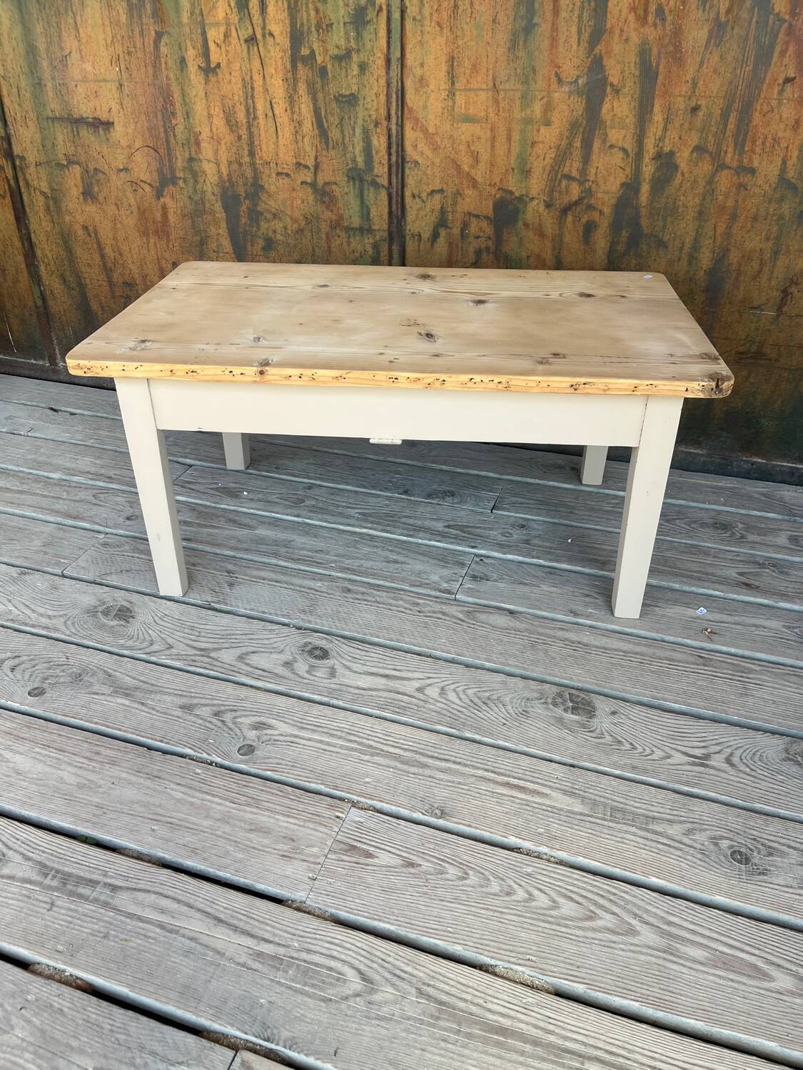 Raw wood and taupe coffee table