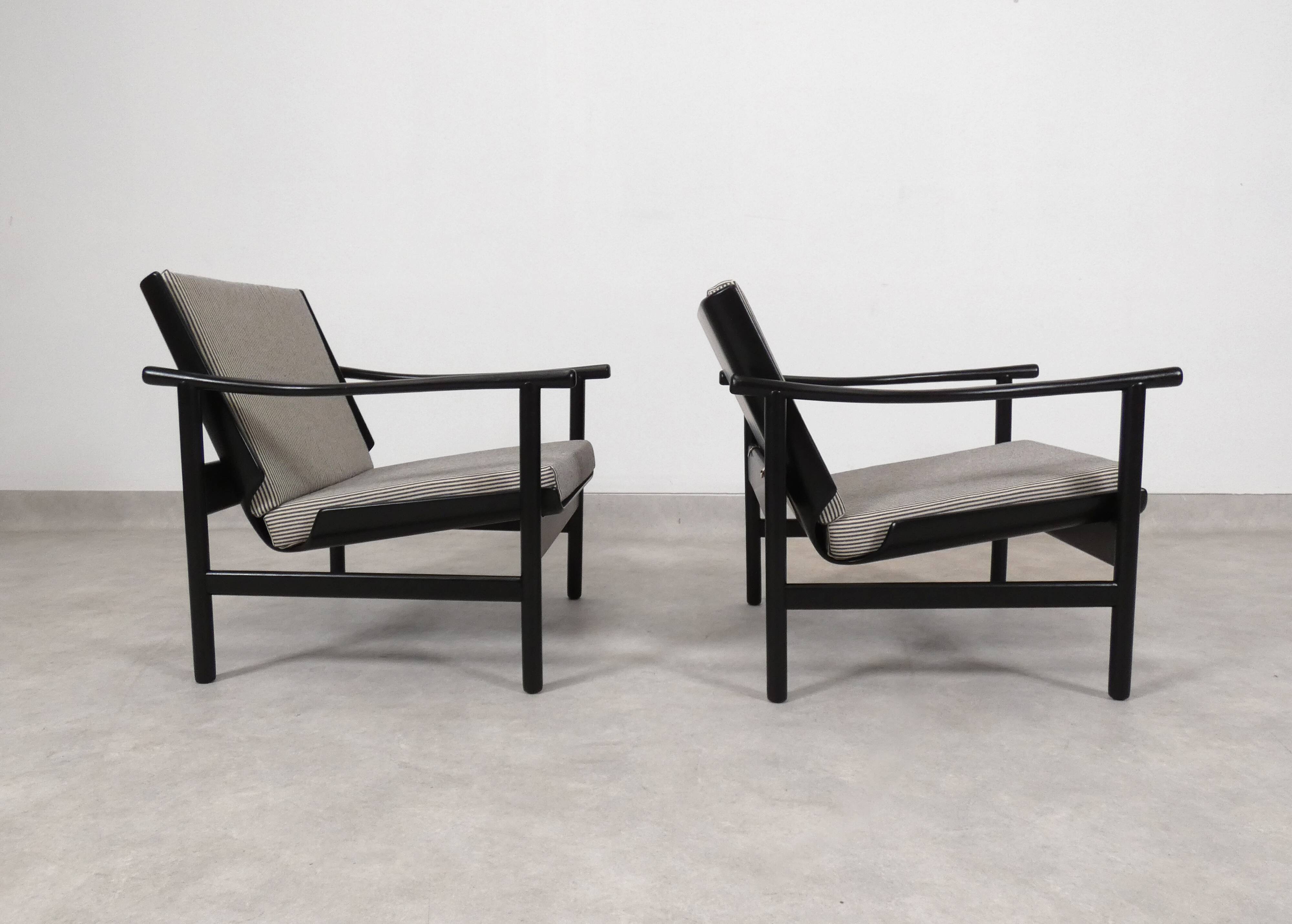 2x wooden Scandinavian arm chairs