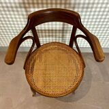 Baumann armchair in curved wood and canework