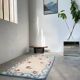 Tapis en laine blanc et bleu fleuri