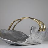 Firewood holder by David Marshall, 1980s