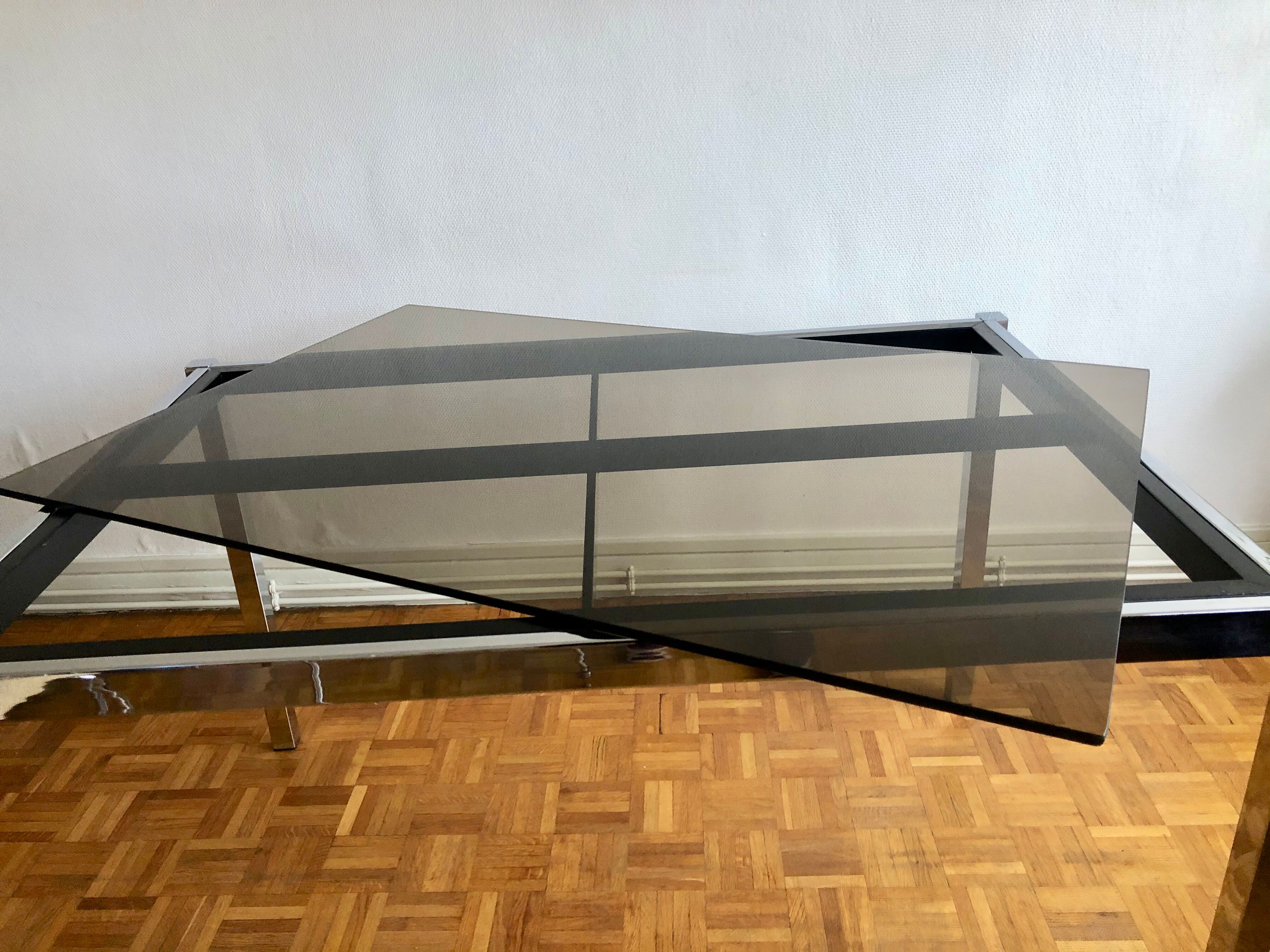 Glass and chrome metal dining table