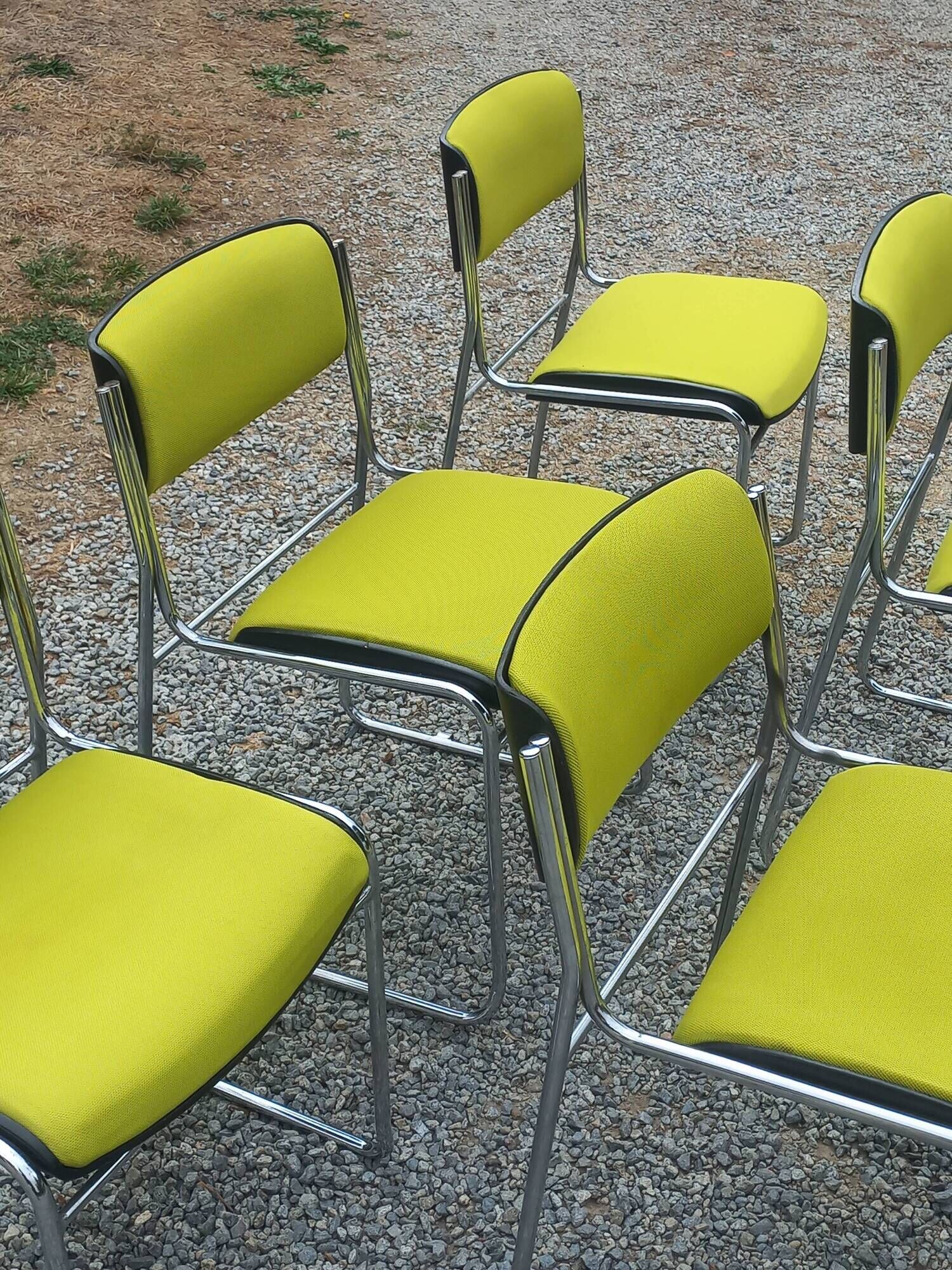 Set of 6 designer chairs with wooden seats and backs, chrome legs.
