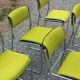 Set of 6 designer chairs with wooden seats and backs, chrome legs.
