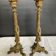 Pair of 19th-century gilded bronze candlesticks in Empire style.