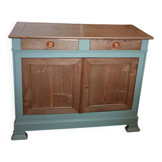 Buffet made of natural wood and bronze green.