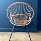 Paire de fauteuils corbeille en rotin - vers 1960.