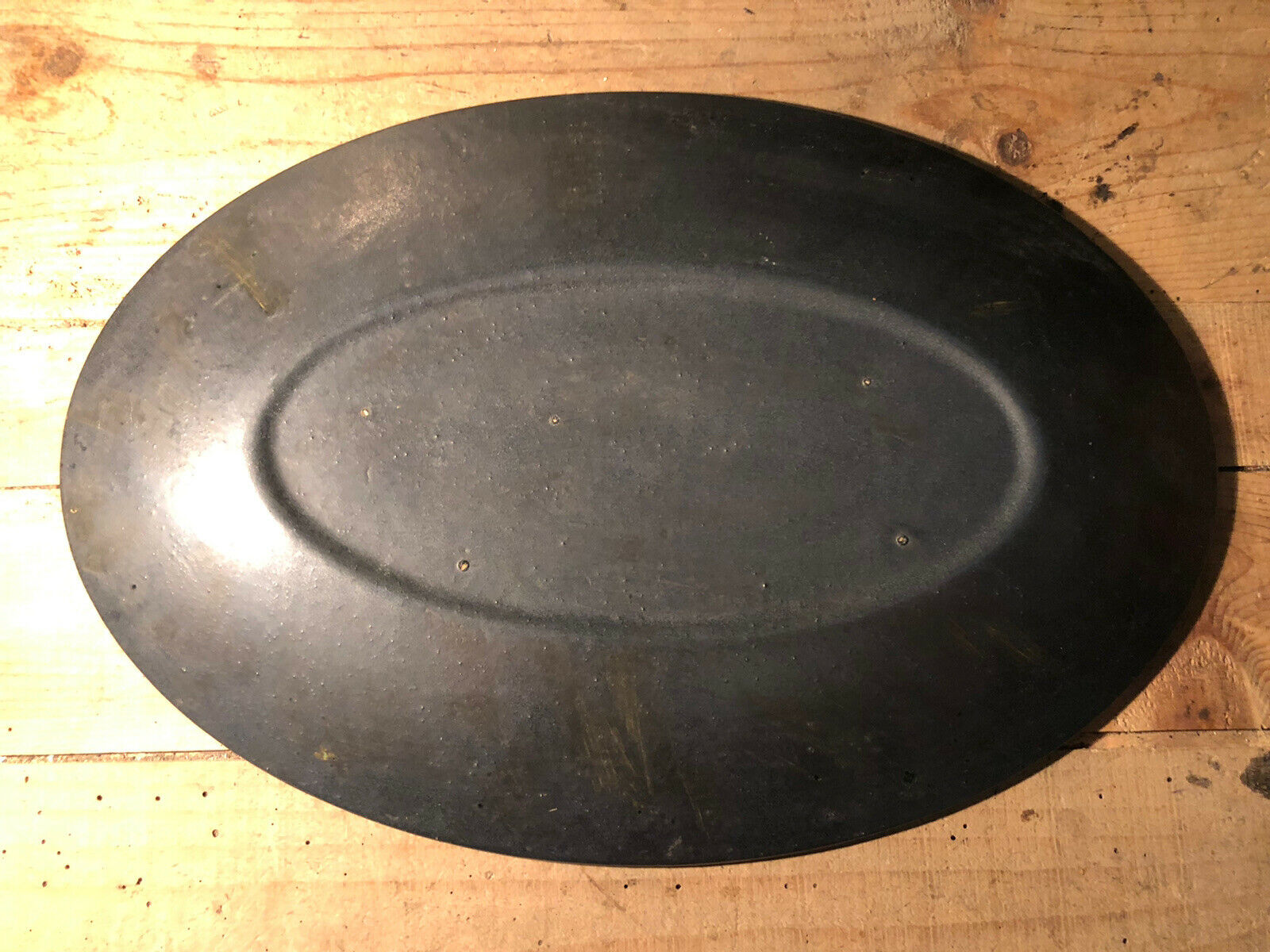Enamelled ceramic dish