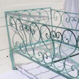 Wrought iron bed and his Swan-neck