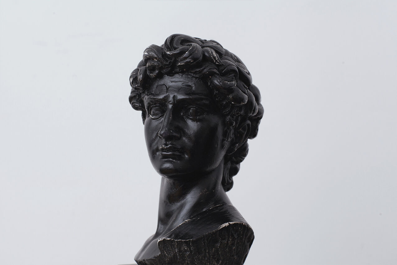 David head in black waxed plaster