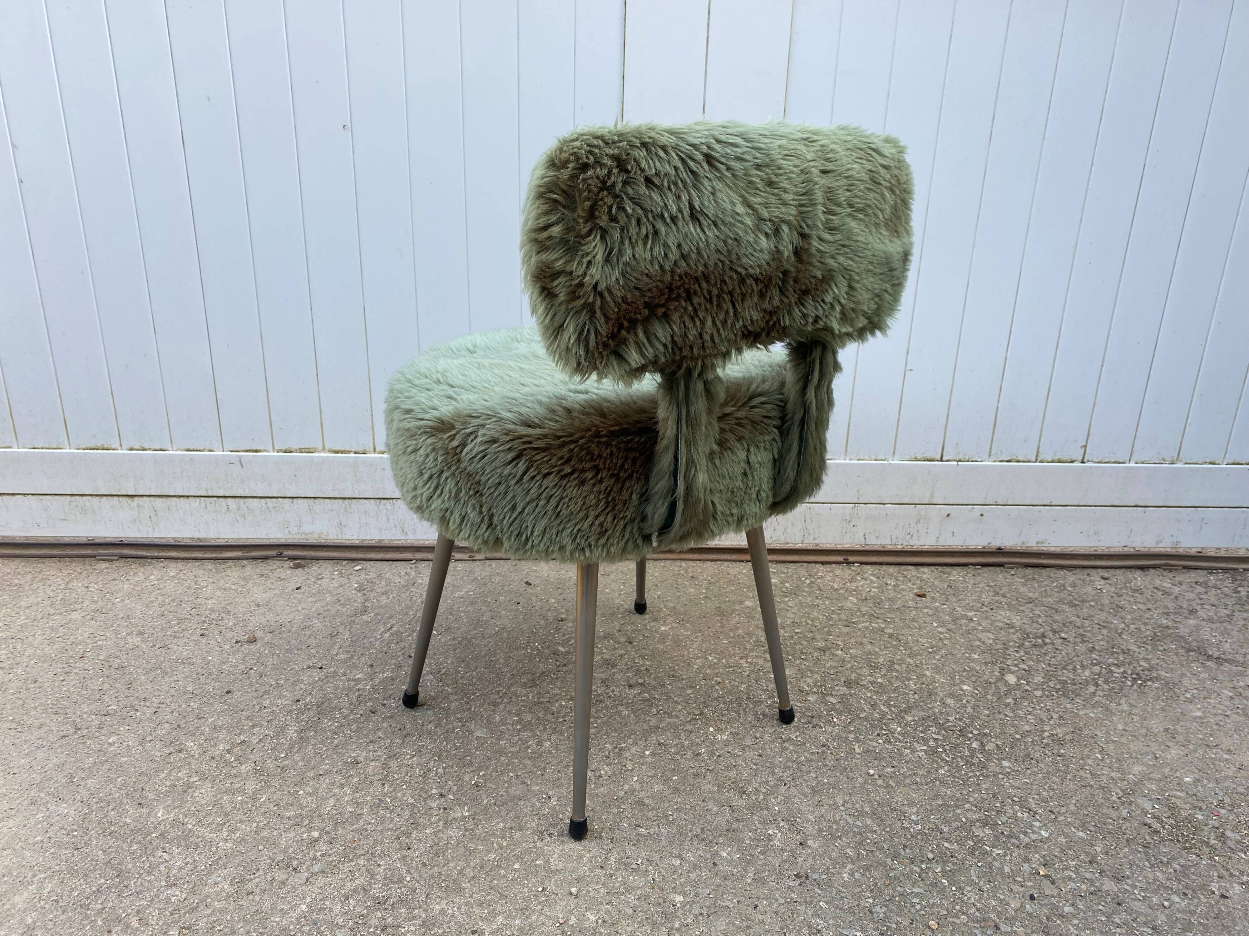 Vintage green furry chair from the 1960s