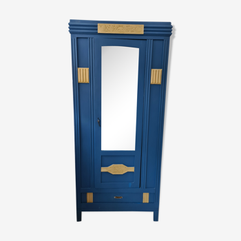 Armoire années 30 style art deco motif réalisé en metaline laiton extérieur bleu intérieur ouatine ti