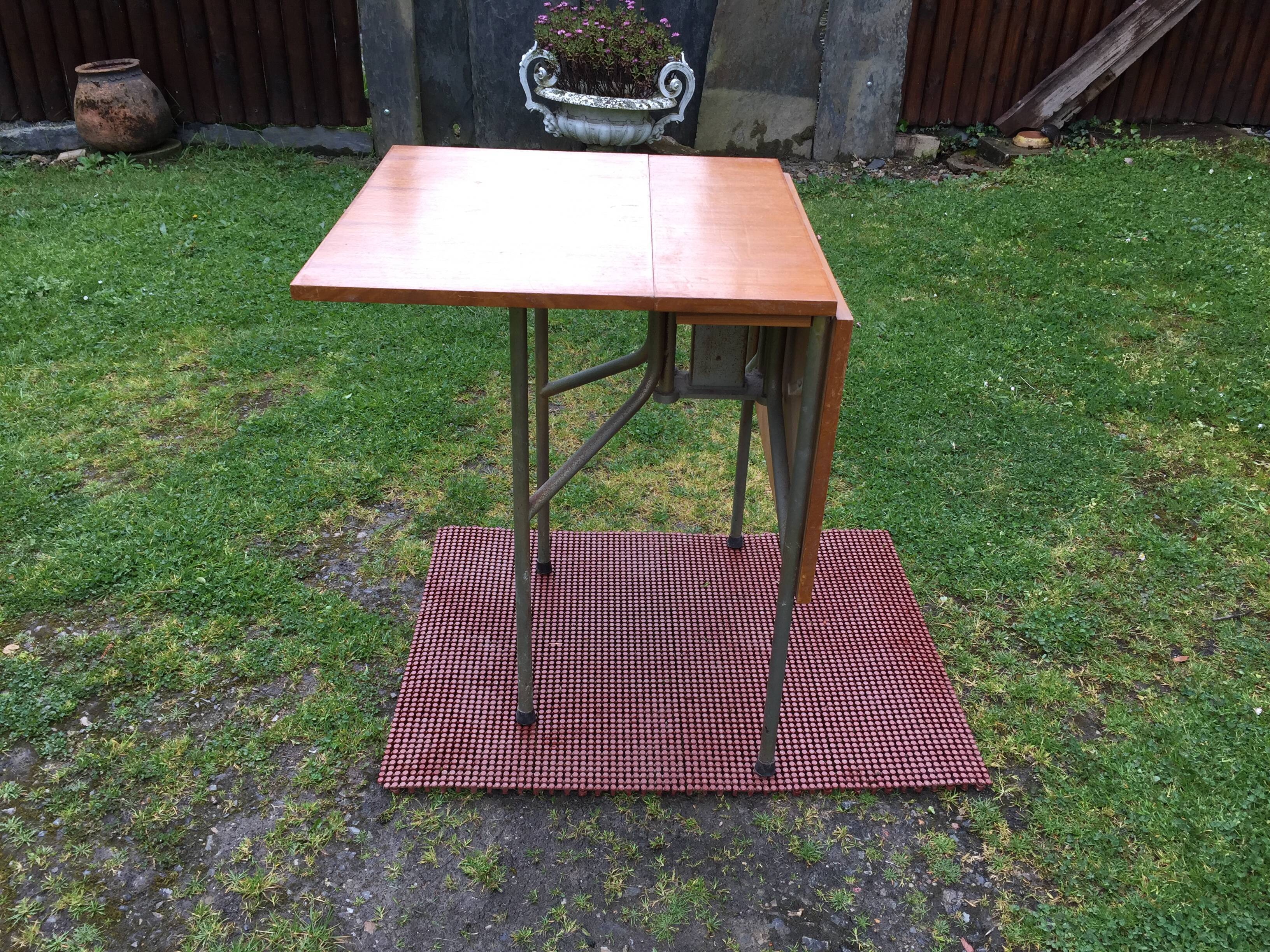 Vintage folding table with teak flaps said wallet with metal tubular base