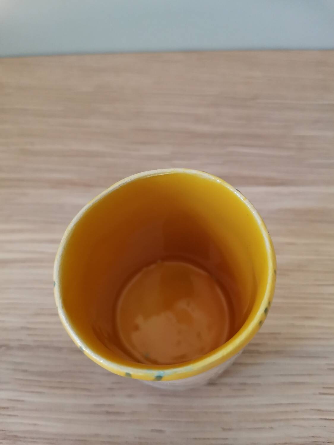 Handmade ceramic coffee cup blue yellow line