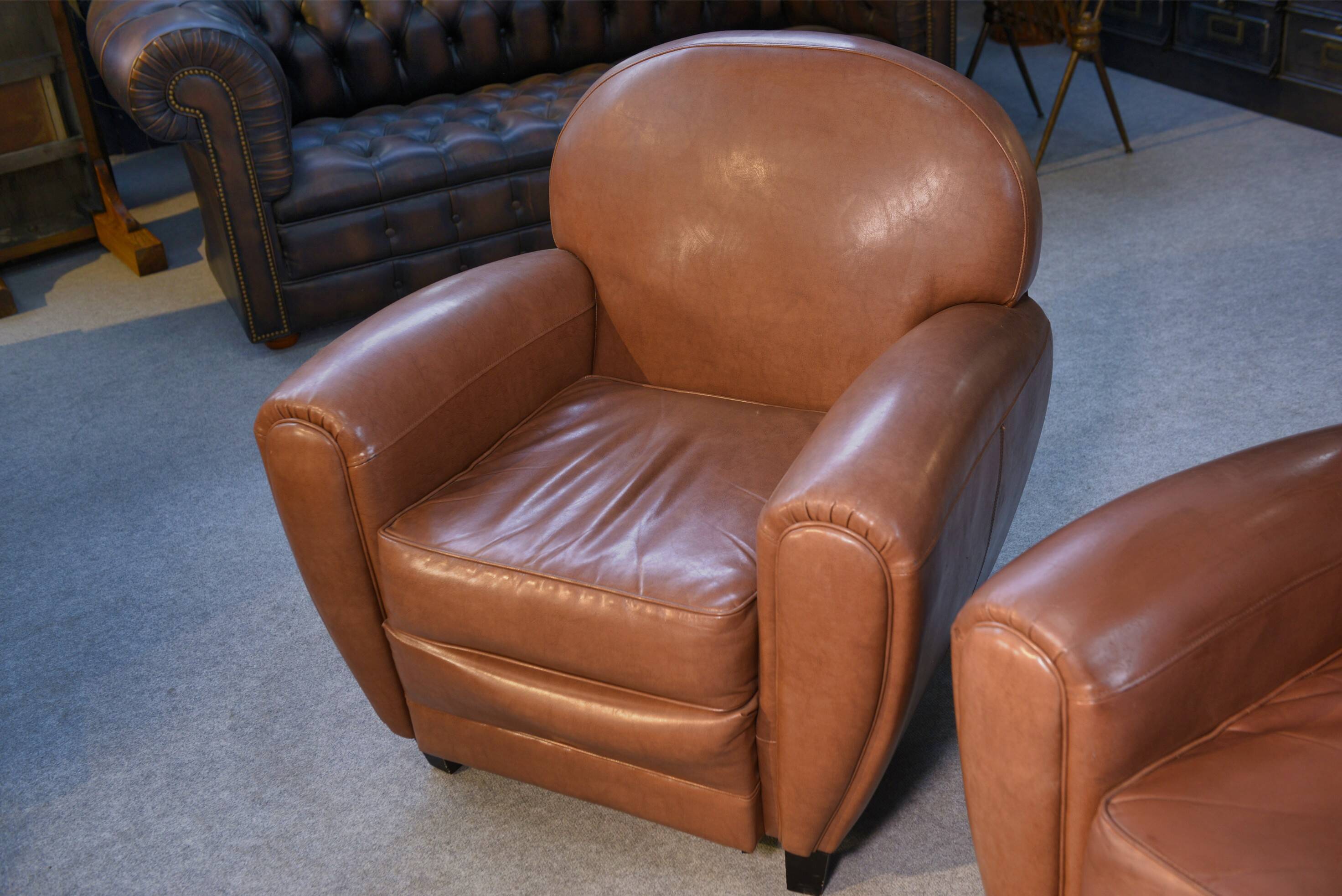 Ensemble 2 fauteuils club en simili cuir camel 1980’s