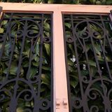 Porte d’entrée ancienne en chêne vitrée grilles en fonte 1925