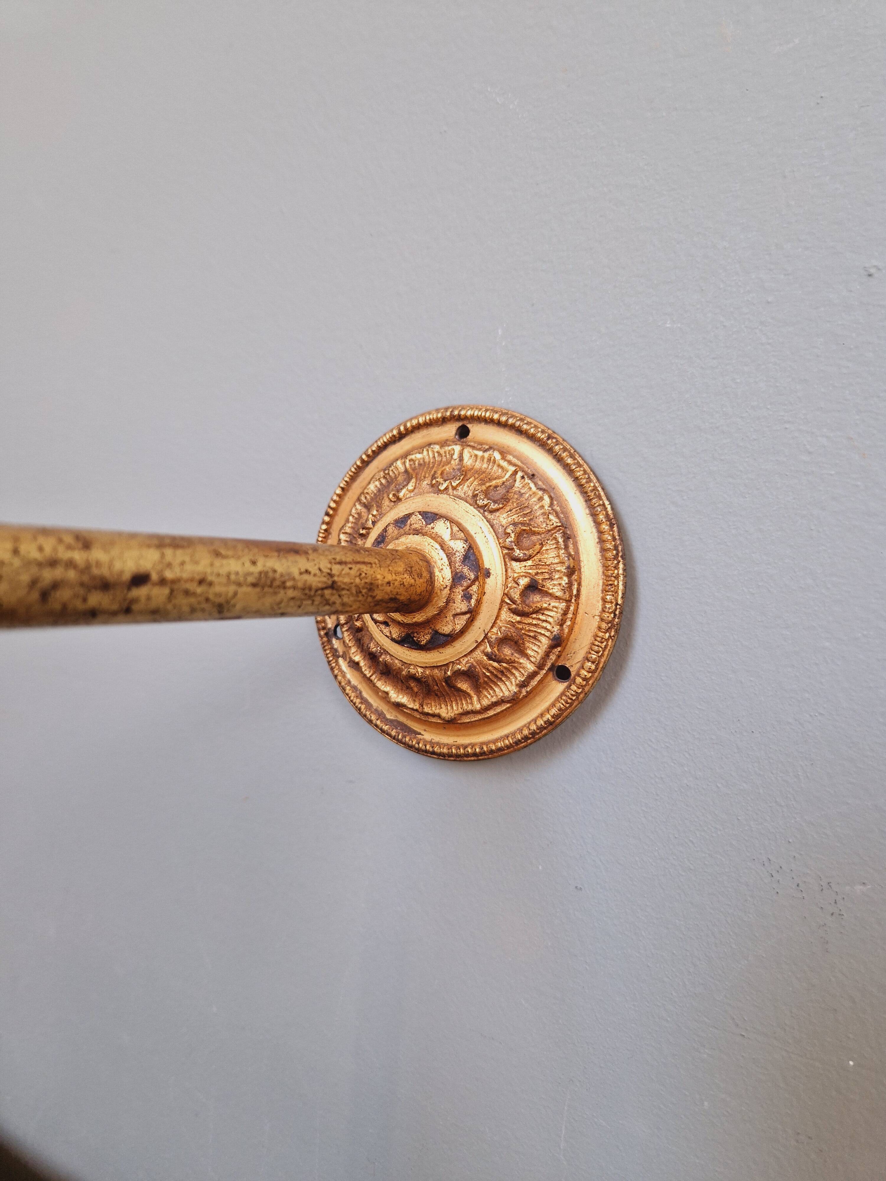 Bronze wall light with grooved clear glass, early 20th century